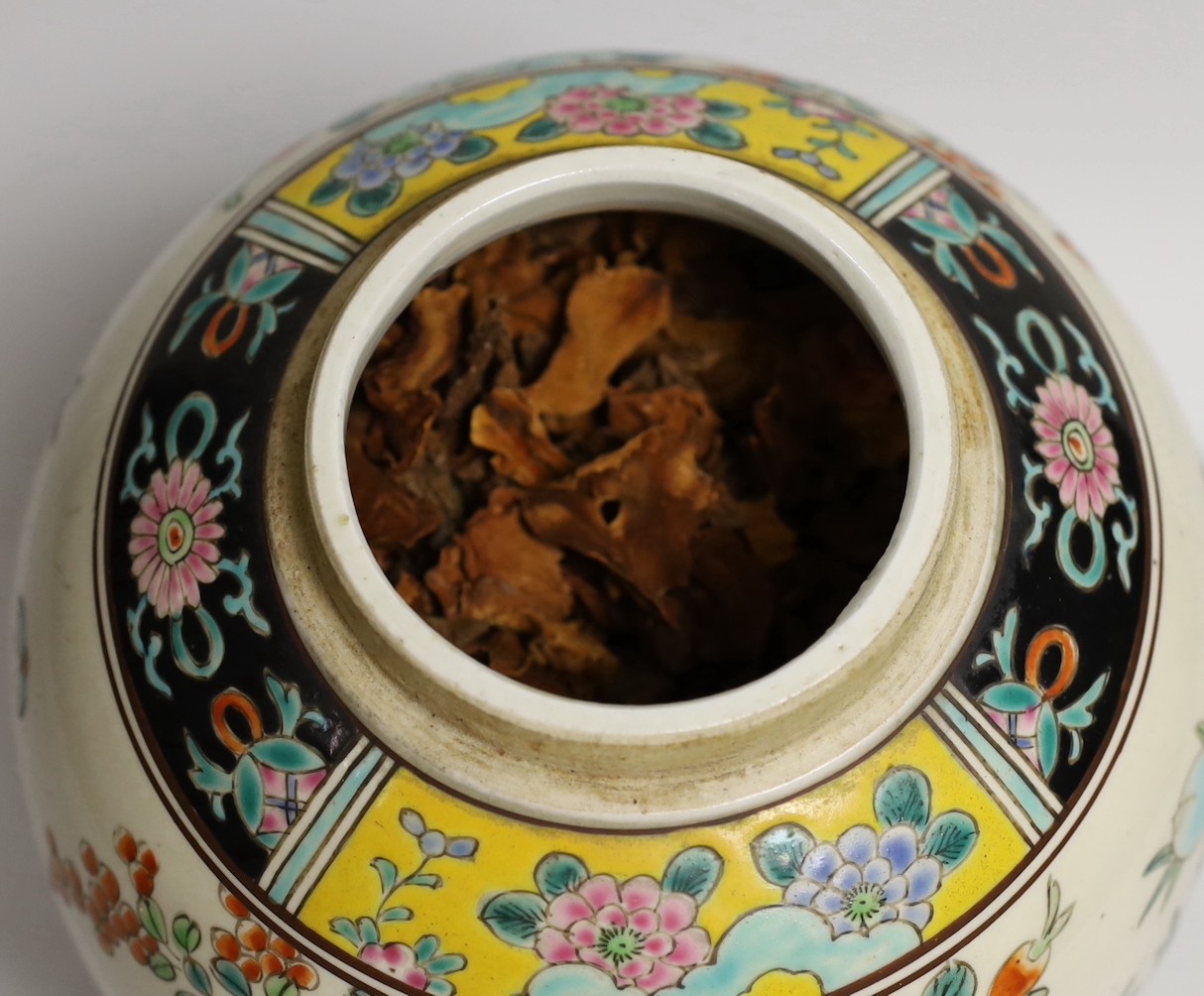 An early 20th century Japanese famille rose jar and cover, 23cms high